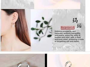 Detailed macro view of elegant silver earrings with round white natural agate stones