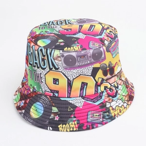 Detail of 90s retro boombox and cassette print on a vibrant reversible bucket hat