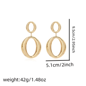 Detailed view showing the dimensions of large gold double oval geometric hoop earrings