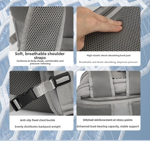 Detail view of breathable mesh straps and reinforced stitching on this gray laptop backpack