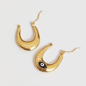 Polished gold U-shaped earrings featuring a classic black and white evil eye enamel design