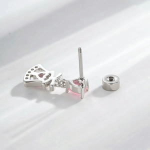 Silver crown bow earring with pink heart zircon and secure screw back closure