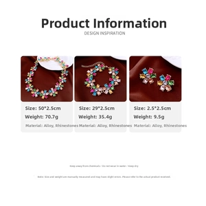Detail of vintage flower jewelry set with colorful rhinestones on brown silk fabric