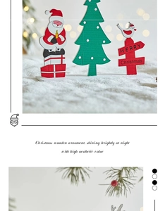 Detailed view of hand-painted wooden Santa Claus and Christmas tree ornaments with stand
