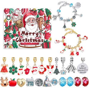 Detailed view of Christmas DIY charm bracelet set with Santa Claus and reindeer charms