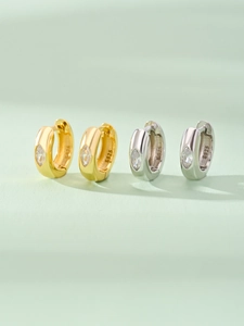 Detailed close-up of S925 sterling silver hoop earrings with marquise zircon stones