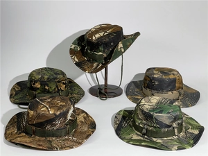 Detailed view of various camouflage patterns on durable outdoor boonie hats with wind ropes