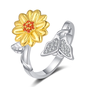 Adjustable spinning ring with yellow sunflower and crystal butterfly on silver band