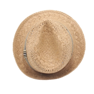 Top view of woven straw cowboy hat with a stylish black and white striped band