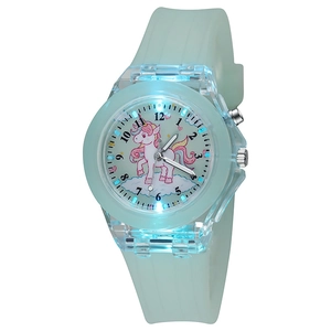 Macro shot of luminous mint green unicorn watch featuring led lights and silicone strap