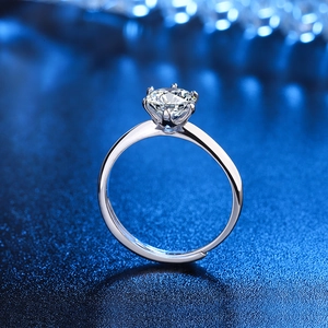 Elegant six-prong solitaire ring with sparkling zircon and adjustable silver band
