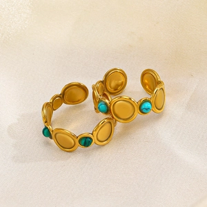 Gold-plated stainless steel geometric rings with turquoise and malachite stone inlays