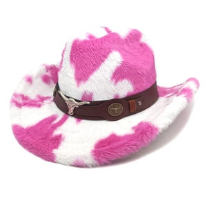 Detail of the pink cow print cowboy hat with metallic bull head buckle and faux leather band
