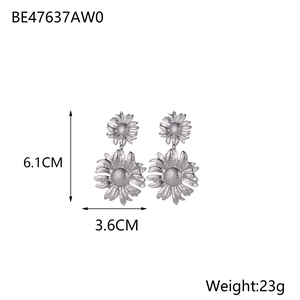 Detailed view of silver sunflower earrings showing 6.1cm height and 3.6cm width