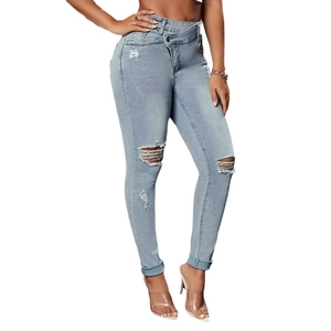 Slim fit light blue distressed denim jeans for women with asymmetric waist and ripped details