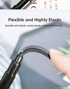 Macro shot of a highly flexible silicone mascara brush head showing its elastic properties