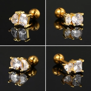 Macro views showing gold cartilage stud with rectangle and teardrop zircons