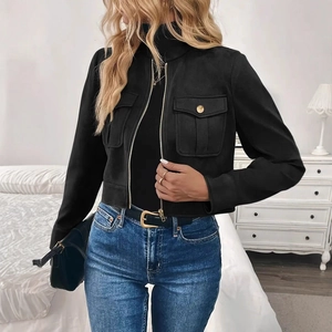 Detail of a black suede-textured vintage jacket with gold zipper and snap pockets