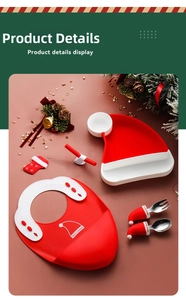Detailed Christmas-themed silicone baby feeding set with bib, plate, and utensils