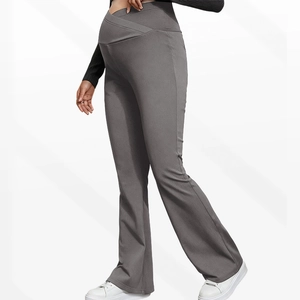 Detail of cross-over high waistband on dark grey maternity yoga flare pants