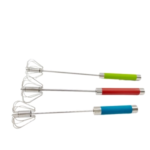 Three colorful semi-automatic stainless steel hand whisks with green red and blue handles
