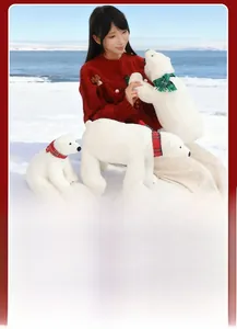 Detailed set of white polar bear plush toys in various sizes with plaid scarves