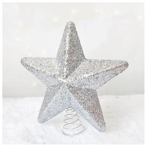 Silver glitter Christmas tree topper star with steady spring base on snow background