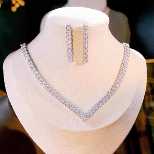 Sparkling silver V-shaped necklace and drop earrings jewelry set with square zircon stones