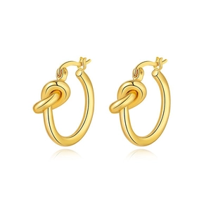 Polished gold knotted hoop earrings in geometric style for women on white background
