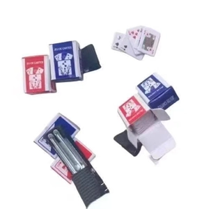 Miniature playing card set with red and blue boxes for funny hair accessories on white background