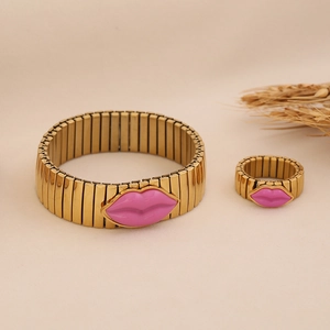 Gold-plated stainless steel jewelry set featuring a pink lip motif on bracelet and ring