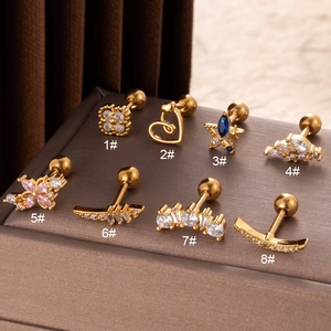 Set of 8 gold stainless steel cartilage earrings featuring heart, flower, and star designs