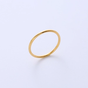 Sleek gold plated titanium steel ring featuring a minimalist high-polish smooth design