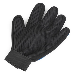 Detail of blue rubber pet grooming glove with breathable mesh back and palm nubs