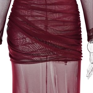 Close-up of deep red mesh fabric with detailed pleated ruching on a sheer sexy dress