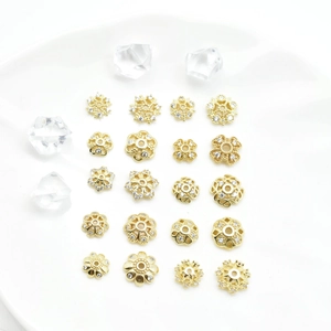 DIY jewelry parts set with 18k gold plated snowflake bead caps and zircon spacers