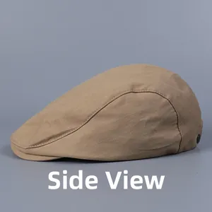 Side view of a khaki flat duckbill ivy cap in breathable cotton canvas with side buckle