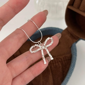Minimalist S925 sterling silver bow necklace with modular metal pendant and snake chain