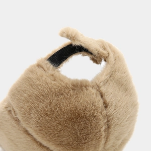 Detail of adjustable Velcro strap on warm faux fur trapper hat in khaki finish