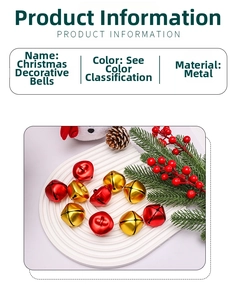 Close-up of red and gold Christmas bells with pine needles and berries for holiday decor