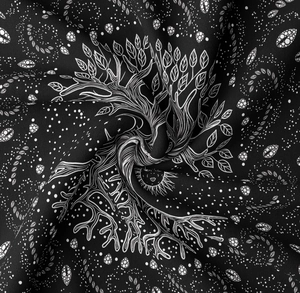 Detailed close-up of tree of life and sun pattern on black bohemian tapestry fabric