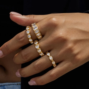 Classic 18K gold plated stainless steel rings with white zirconia in four unique shapes