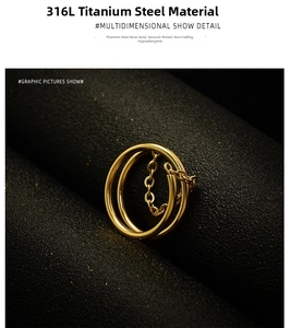 Detail of 18K rose gold plated double layer ring with fine chain on black display