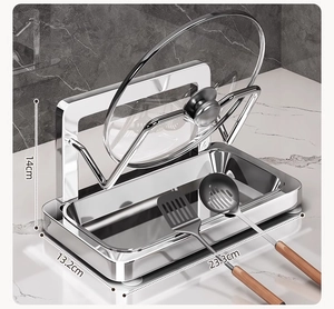 Detailed view of stainless steel pot lid rack showing dimensions 23.3x13.2x14cm and drip tray