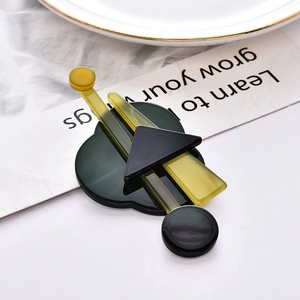 Artistic geometric acrylic brooch with green and yellow color-block design