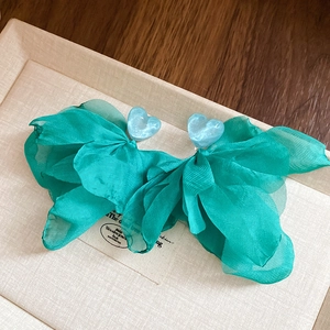 Exaggerated light blue heart resin earrings with dark green organza bow charms