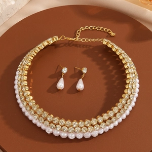 Elegant gold layered necklace and earring set with crystals and pearls for women