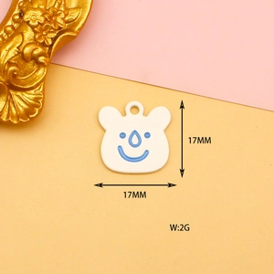 Detailed close-up of a white bear alloy pendant showing dimensions 17mm and 2g weight