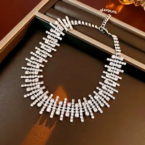 Elegant sparkling rhinestone fringe necklace with architectural tassel design in silver