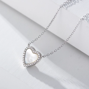 Elegant S925 sterling silver heart necklace with white shell inlay and zircon accents
